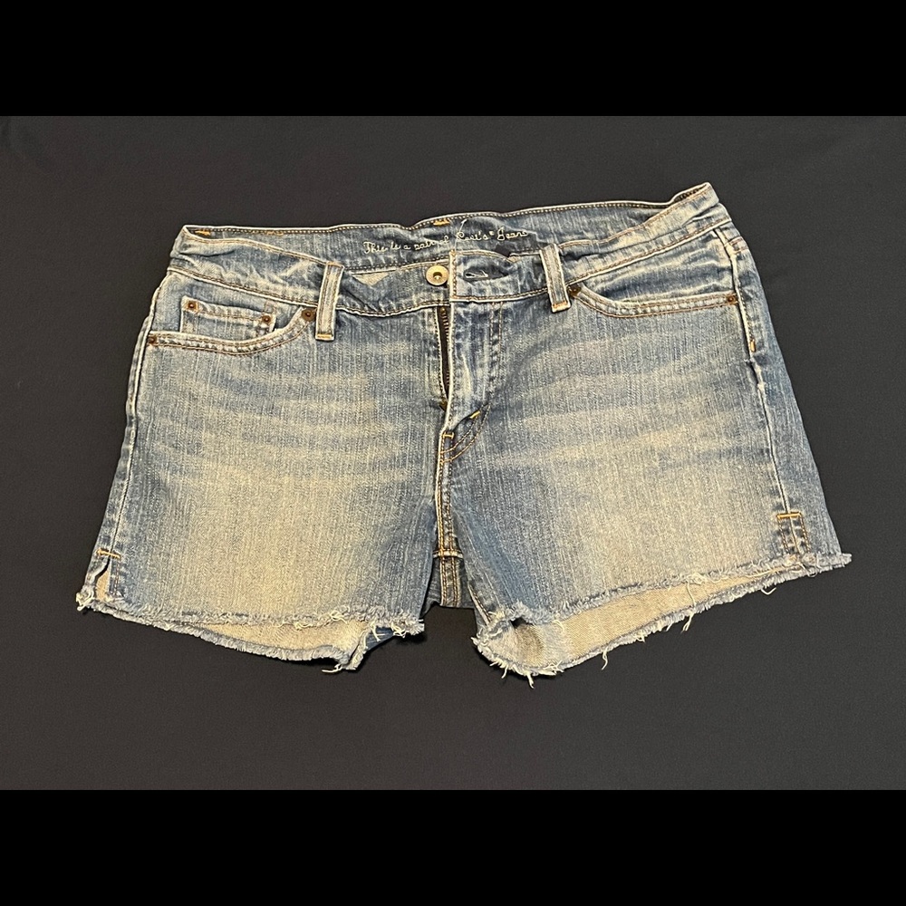 Levi’s Cut Off Frayed Hem Denim Shorts